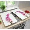 Set 2 Couvre-plaques Protection Motifs Orchidée -DE BUYER Ventes 62346 0 1 Set 2 couvre plaques protection motifs Orchidee Wenko by Maximex